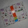 Protège carnet de santé bébé et enfant démonstration tissu fond blancs avec animaux de couleurs pastels